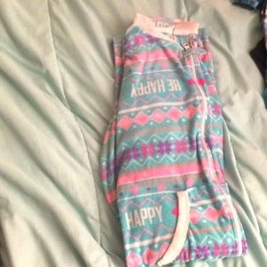 Long multicolor pajamas that has nail polish spill